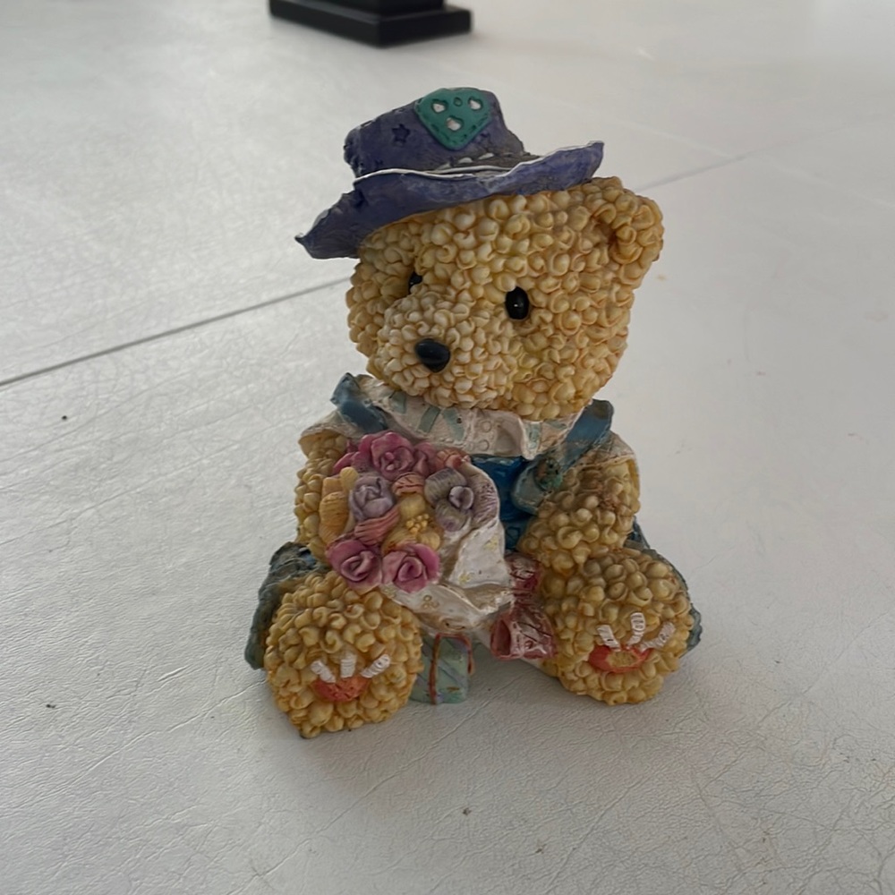 Bear piggy bank . Great for loose change. Great for a child. Accent to shelf